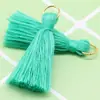 Punto al por mayor 20 colores 3cm marcapáginas de ropa pin colgante anillo de tracción de aleación color sólido mini algodón poliéster borla pequeña fábrica