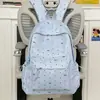 Mochila nueva de estilo ins, simple, de gran capacidad, con diseño de lazo de lunares, bolso escolar versátil de nicho para mujer