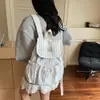Mochila listrada de estilo coreano muito estilosa para estudantes universitárias, adequada para o trajeto diário, uso casual e atividades ao ar livre.