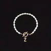 2025 Moda Nueva Transfronteriza Pulsera de Letras Inglesas Cobre Incrustado Circonita Oval Perla de Imitación Pulsera de Perlas al por Mayor