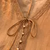 Toma real 2026 Otoño Nuevo Camisa Artística Retro de Cuello en V y Manga de Farol para Mujer con Lazo de Encaje Estilo Suave Adelgazante Top