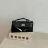 Bolso Kelly de Mano con Patrón de Cocodrilo Vintage para Mujer 2026 Nueva Moda Versátil para Viajes Diarios Bolso de Hombro Cruzado para Exportación