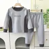 Novo conjunto de roupa íntima térmica infantil para outono e inverno, estilo coreano, design sem costura, adequado para meninos e meninas, roupa de casa e pijamas