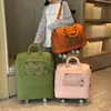Bolsa de viaje transfronteriza de gran capacidad, conveniente para salir, ruedas universales desmontables, bolso de mano, maleta, se puede colocar en un carrito