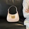 Bolso de cuadros de nicho exquisito y moderno para mujer, nuevo modelo 2026, minibolso cruzado versátil, bolso tipo dumpling, bolso de mano pequeño para salir