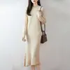 Vestido de Punto de Lana Pura 2026 Otoño/Invierno Nuevo Cuello Redondo Medio Alto Manga Larga para Mujer Dobladillo Retorcido Vestido Largo