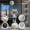 Lámpara de proyección de estrellas astronauta sala de estar adornos grandes de piso mueble de TV sofá decoraciones de inauguración de casa
