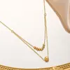 Collar de cuentas de arroz de doble capa de acero inoxidable y oro de 18 quilates para mujer, tendencia de diseño transfronterizo de Europa y Estados Unidos, que no se decolora