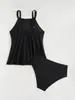 Tankini negro conservador de estilo europeo y americano con cuello halter, frente fruncido y falda acampanada, diseñado para cubrir el abdomen y crear un efecto adelgazante, traje de baño de dos piezas para mujer