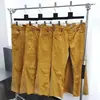 Ga Venta al por Mayor Comercio Exterior Transfronterizo Marca de Moda Jeans de Mezclilla Acampanados Lavados Desgastados Patchwork Unisex