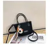 Moda de textura transfronteriza nicho bolso cubo bolso de mujer 2026 nuevo otoño retro simple bolso de hombro bolso cruzado moderno