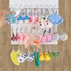 Aretes nuevos transfronterizos de mariposa linda, traje para mujer, dulces japoneses y coreanos, resina, piña, dados, cartas, traje de aretes, venta al por mayor