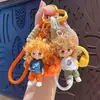 Lindo llavero de muñeca de pelo rizado, perfecto para niños, parejas o como accesorio para bolsa; llavero de muñeca de dibujos animados, regalo pequeño, al por mayor