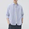 Camisa de hombre de tela Oxford a rayas estilo japonés 2026 nuevo otoño algodón puro cuello camisero manga larga chaqueta venta al por mayor