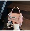 Bolsa Kelly de Platina de Alta Costura Transfronteiriça para Mulheres 2026 Nova Coleção de Primavera Bolsa de Mão Elegante Bolsa Quadrada Pequena de Ombro Transversal