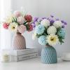 Decoraciones para el hogar flores artificiales flores falsas sala de estar decoraciones de alta gama dormitorio ins flores de plástico arreglo floral