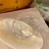 Pulsera de perlas estilo francés para mujer, nuevo modelo 2026, lujo ligero, alta gama, accesorio de mano exquisito y elegante, se ve genial al superponerlo, un hermoso accesorio