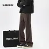 Pantalones de otoño para hombre de color liso estilo Hong Kong para calle alta con caída, corte simple y limpio, microcampana, de pierna ancha hasta el suelo