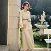Otoño 2026 Nueva Moda Casual Juvenil Adelgazante Elegante Irregular Chaleco Camisa Falda Conjunto de Tres Piezas