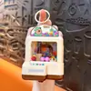 Llavero Creativo de Dibujos Animados Máquina de Garra Brillante Atrapador de Bolas Juguete para Aliviar el Estrés Colgante Regalo Venta al por Mayor