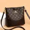 Bolso de Cubo de Cuero Suave Retro Bolso de Hombro Simple de Moda Versátil Bolso Cruzado de Lujo Ligero de Gama Alta Impermeable Resistente al Desgaste