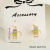Brinco de Argola para Orelha Geométrico de Zircônia Microincrustada com Pingente de Óleo Novo Estilo Comércio Exterior Banhado a Cobre Dourado Brincos Versáteis da Moda INS para Mulheres