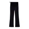 Moda Gestante Outono 2026: Design simples de gola V, patchwork de bolinhas, top babydoll, calça levemente flare com suporte para a barriga