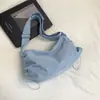 Bolsa de ombro casual de cor sólida de grande capacidade, simples e elegante, novo modelo da primavera de 2026, bolsa transversal de alta aparência para viagens