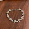 Pulsera Estilo Coreano con Broche de Flor de Circonita Cúbica Lujo Ligero Moda de Alta Gama Exquisita Cadena de Mano Versátil Joyería de Mano para Mujeres