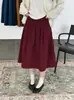 Falda de Paraguas de Longitud Media de Estilo Coreano Simple de Alta Gama A-Line para Mujer Cintura Elástica Holgada Cubre las Caderas Adelgazante 2026
