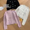 Cardigan de punto de alta calidad con hombrera de oveja lechosa