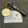 Shenzhen Shuibei Oro 999 Oro Puro Nuevo Logo de Coche Llavero Colgante Popular en Transmisiones en Vivo de Tiktok Mayorista de Fábrica