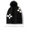 Gorro de punto nuevo estilo coreano para otoño e invierno, gorro holgado de lana reciclada, gorro de punto RPET con protección para las orejas, dropshipping transfronterizo