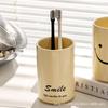 Copo para enxaguante bucal com rosto sorridente cerâmica atacado copo para escova de dentes criativo simples doméstico copo de lavagem escova de dentes Copo de Dente Copo de Dente casal