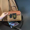 Bolso de mujer de alta gama 2026 nuevo diseño de moda nicho francés bolso de hombro retro bolso cruzado versátil