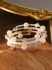 Pulseira Europeia e Americana de Pérola com Múltiplos Círculos Cravejada com Zircônia Colorida Pulseira Versátil Pulseira Totalmente Cravejada de Diamante High-end Ajustável