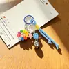 Novo Chaveiro de Girassol Sorridente de Desenho Animado Pingente de Sino de Corda Trançada Venda Quente Transfronteiriça Acessório de Decoração de Bolsa