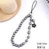 Estilo Chanel Perla Falsa Flor de Camelia Moderna Cadena para Teléfono de Perlas Falsas Accesorio de Cristal de Lujo Ligero Llavero