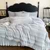 Juego de ropa de cama de cuatro piezas estilo lujo con pelo de conejo y terciopelo de leche, con un diseño de alta gama, engrosado para abrigar y adecuado para uso invernal