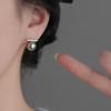 Pendientes de lujo ligeros con clip de perla gris y circonita, sin orejas, diseño de nicho, personalidad retro avanzada, sencillos y combinables con todo.