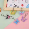 Llavero de Mariposa Colorida, Mochila Escolar para Niña, Funda para Auriculares, Colgante de Acrílico, Llavero, Accesorios, Regalo de Vacaciones