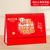Calendario de Escritorio 2027 con Innovador Diseño de Flor de Ventana Finamente Tallada, Calendario de Arte Chino Rojo Grande del Año del Cabra