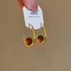 Brincos Olho de Tigre Estilo Melanoid Retro Senso de Design de Nicho Brincos Versáteis Luxo Leve Moda de Alta Qualidade Brincos de Tarraxa para Mulheres