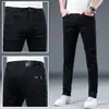 Jeans preto de alta qualidade, nova coleção de primavera, não desbota, para homens, corte slim, versátil, elástico, calça comprida de marca moderna para homens