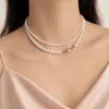 Collar con hebilla con fuelle de perla Shijia estilo francés de alta gama, estilo retro, estilo coreano, cadena de clavícula de nicho de lujo ligero.