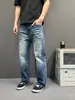 Jeans rectos holgados retro desgastados con patrón de relámpagos y bigotes para hombre y mujer, pantalones largos casuales americanos rectos holgados de marca moderna