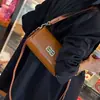 Bolsa de Hombro Retro para Primavera y Verano 2025 Bolso Baguette Bolso de Hombro Cruzado de Gama Alta Textura de Cadena de Nicho Bolso Cuadrado Pequeño