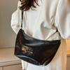 Bolsa retrô de alta qualidade de cor sólida feminina 2025 nova primavera e verão all-match bolsa de ombro simples bolsa transversal nicho bolsa de bolinho