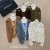 Tienda Insignia Shanghai Danong/Novedad Otoño 2026 Cárdigan de Punto de Lana Casual Estilo Francés Cuello en V Falso Dos Piezas