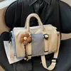 Nueva bolsa de viaje de moda de comercio exterior, gran capacidad, diseño moderno y minimalista, adecuada para viajes cortos, viajes de negocios y uso en el gimnasio, se puede llevar en la mano o usar como bolsa cruzada
